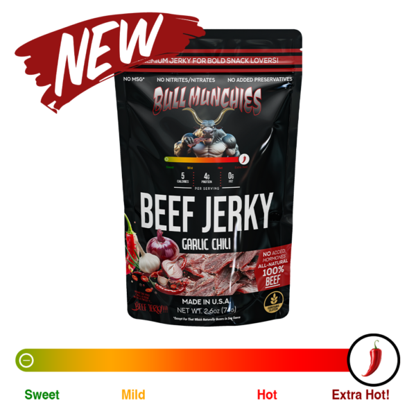 Promotional image of Bull Munchies Garlic Chili beef jerky, featuring a bold red and black packaging design with a muscular cartoon bull eating jerky. The label highlights ‘All-Natural Beef Jerky,’ ‘No Added Hormones,’ and a ‘New’ product banner.