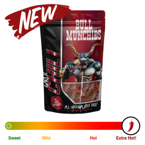 Promotional image of Bull Munchies Garlic Chili beef jerky, featuring a bold red and black packaging design with a muscular cartoon bull eating jerky. The label highlights ‘All-Natural Beef Jerky,’ ‘No Added Hormones,’ and a ‘New’ product banner.