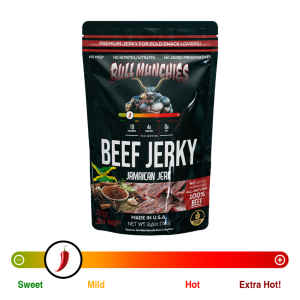 Bull Munchies Jamaican Jerk Beef Jerky packaging featuring a muscular bull character holding a piece of jerky. The package highlights ‘No Added Hormones,’ ‘All-Natural Beef Jerky,’ and ‘Net Wt. 2.6 oz (74 g).’ The jerky inside is visible in the lower part of the package.“​