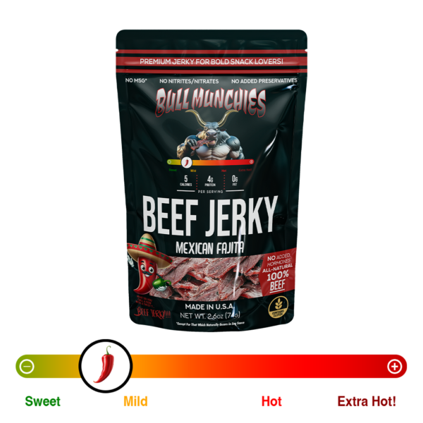 Bull Munchies Mexican Fajita Beef Jerky packaging featuring a muscular bull character holding a piece of jerky. The package highlights ‘No Added Hormones,’ ‘All-Natural Beef Jerky,’ and ‘Net Wt. 2.6 oz (74 g).’ The jerky inside is visible in the lower part of the package.“​