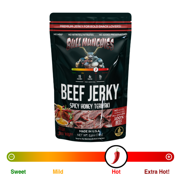 Bull Munchies Spicy Honey Teriaki Beef Jerky packaging featuring a muscular bull character holding a piece of jerky. The package highlights ‘No Added Hormones,’ ‘All-Natural Beef Jerky,’ and ‘Net Wt. 2.6 oz (74 g).’ The jerky inside is visible in the lower part of the package.